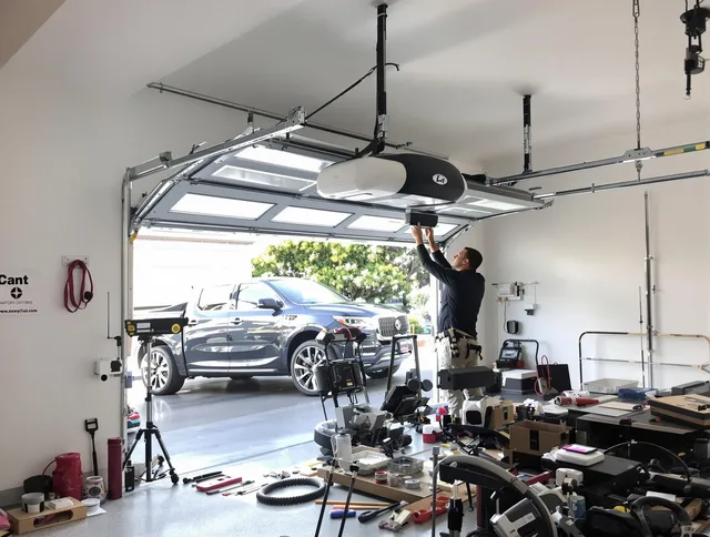 Baldwin Park Garage Door Repair specialist installing smart garage door opener system in Baldwin Park home