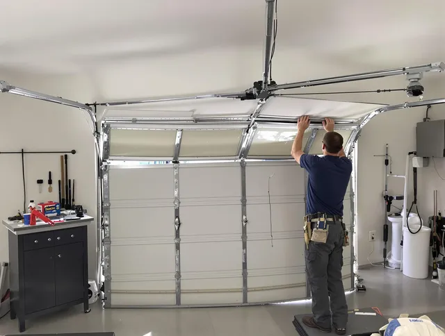 Baldwin Park Garage Door Repair specialist performing precise section replacement on Baldwin Park garage door